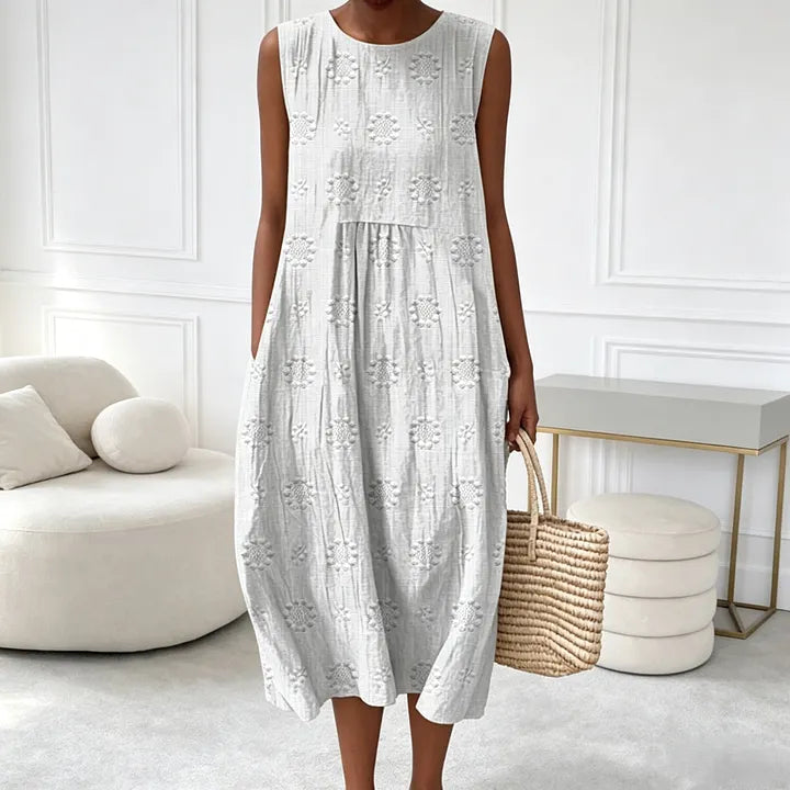 Vestido sem mangas com bordado floral (com bolsos)