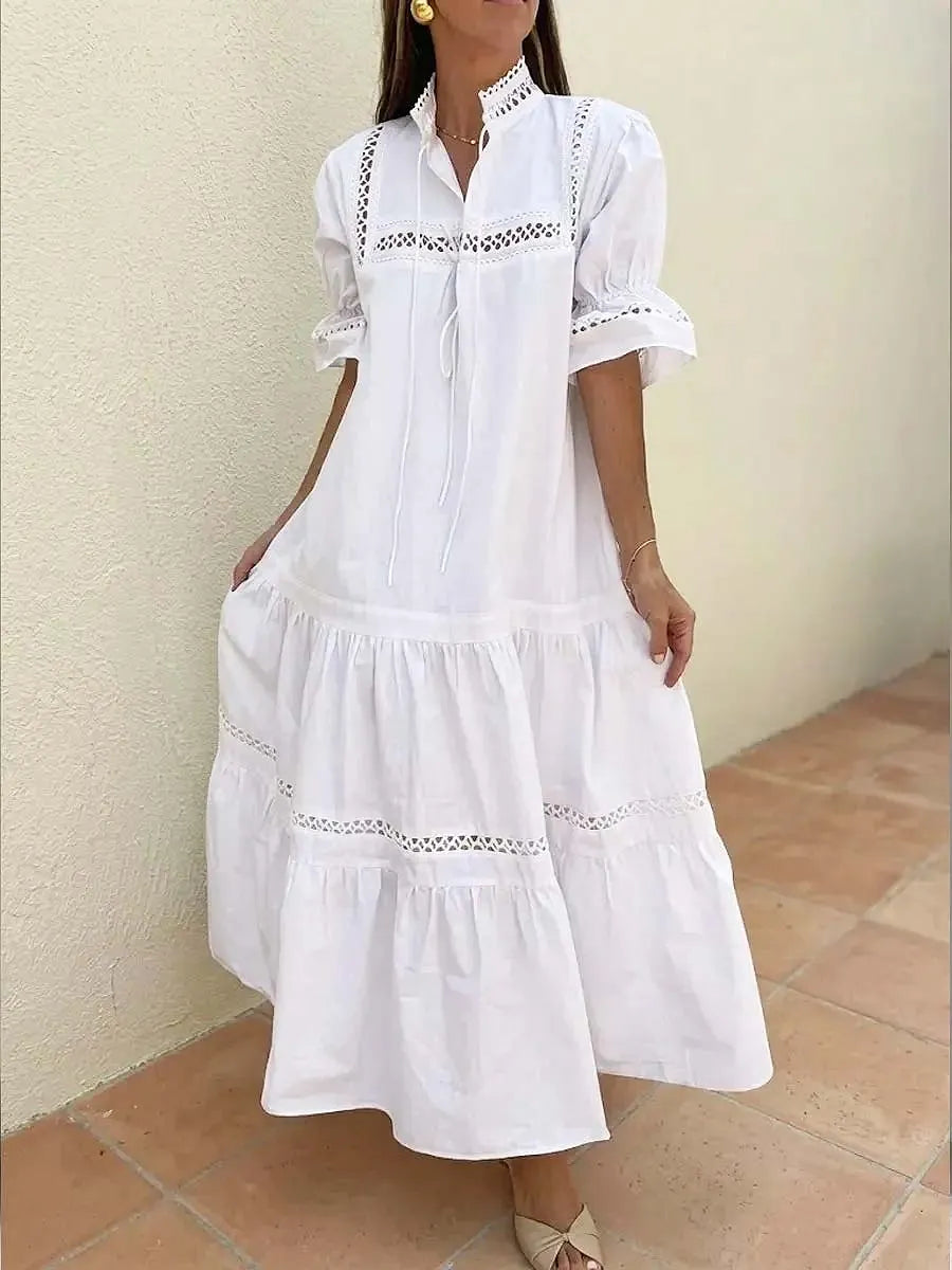 Vestido comprido de senhora em algodão e linho com estampado vazado e cores sólidas.