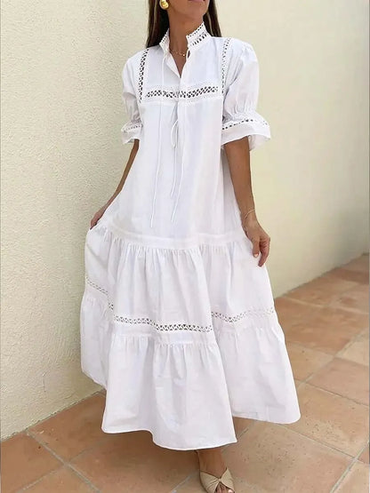 Vestido comprido de senhora em algodão e linho com estampado vazado e cores sólidas.