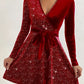 Vestido elegante em veludo com decote em V
