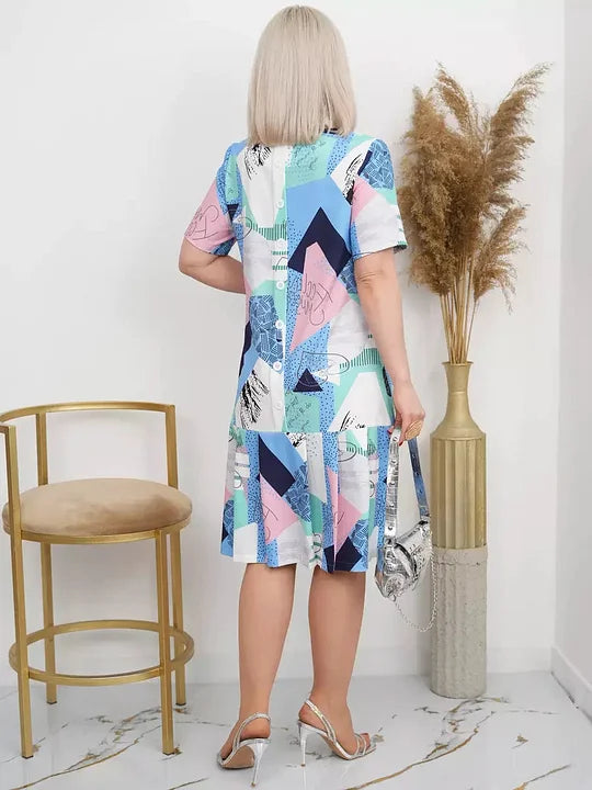 Vestido midi para menina com estampado geométrico e barra franzida