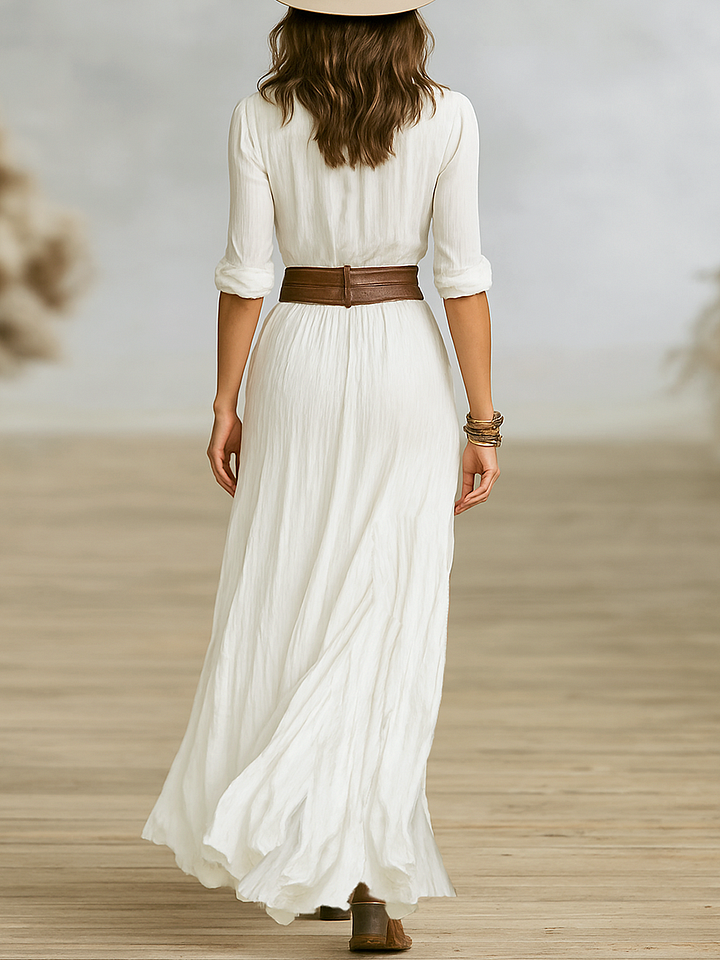 Vestido de senhora de manga comprida, abotoamento simples, em imitação de algodão e linho, com lapela plissada