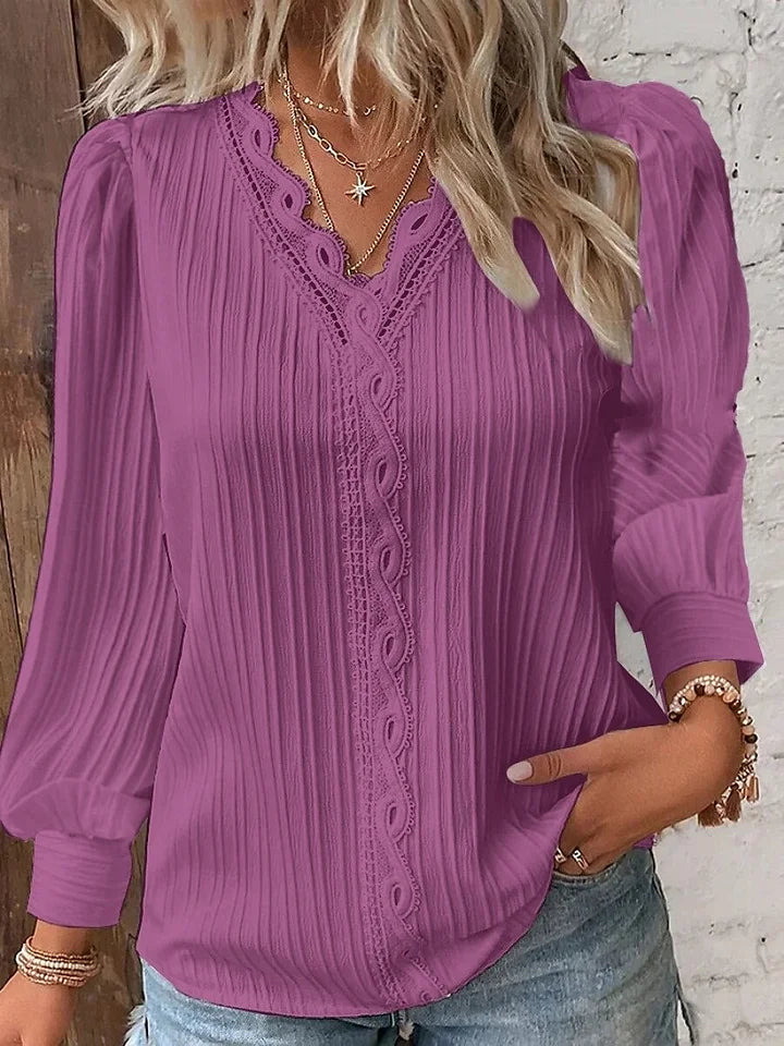 Camisa de senhora em renda, elegante e moderna, de cor sólida