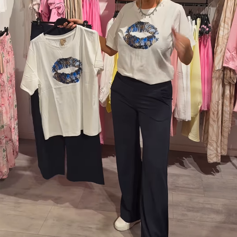 Conjunto de duas peças para menina com estampado, blusa e calça