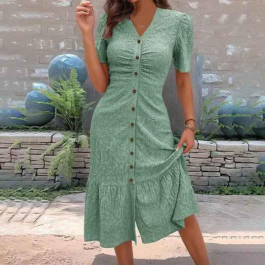 Elegante vestido midi de renda com decote em V, mangas abalonadas e folhos.