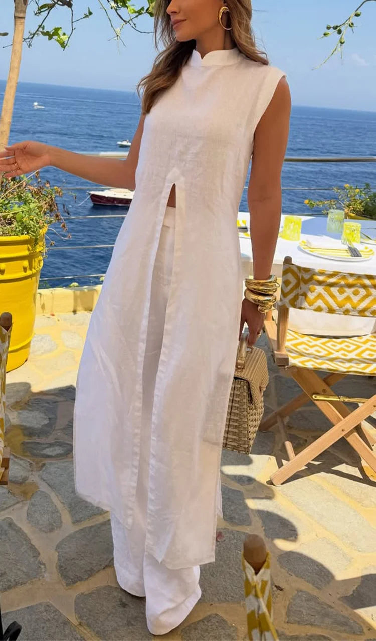 Conjunto casual para mulher com blusa comprida de gola redonda e calças de cor lisa