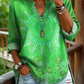 Camisa casual de mulher em algodão denim lavado com estampado floral de girassóis e decote em V.