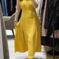 Vestido de senhora em algodão e linho, liso, sem mangas, com decote em V e corte largo.