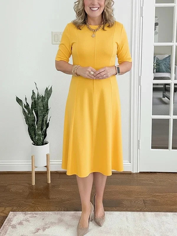 Vestido midi liso com mangas 3/4 e decote redondo