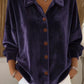 Blusa elegante em veludo com abotoamento simples