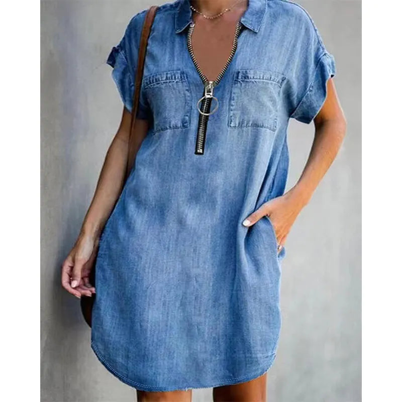 Vestido-camisa de ganga para menina de corte solto – vestido com gola, bolsos e fecho de correr.