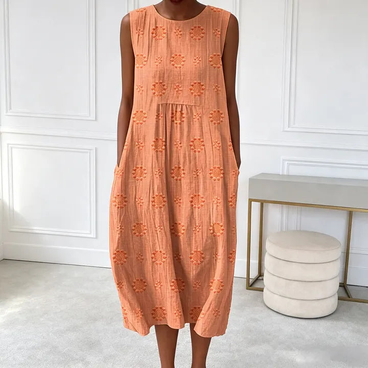 Vestido sem mangas com bordado floral (com bolsos)