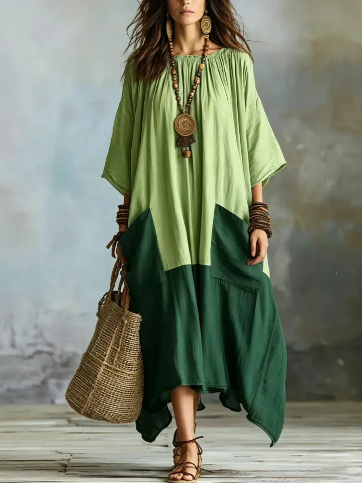 Vestido de senhora em algodão e linho com modelagem larga e corte evasé, em blocos de cor