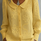 Camisola retro de gola redonda com bordado floral