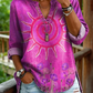 Camisa casual de mulher em algodão denim lavado com estampado floral de girassóis e decote em V.