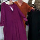 Vestido túnica plissado, solto e casual, com decote em V