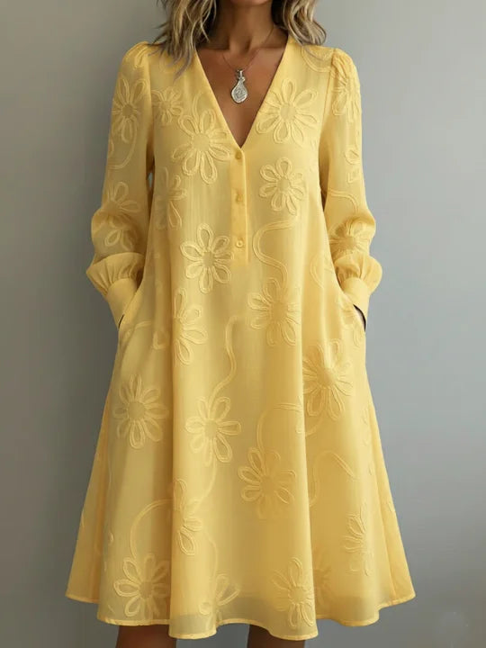 Vestido vintage elegante com decote em V e bordados florais