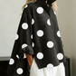 Blusa de ganga elegante com estampado artístico de bolinhas e gola alta