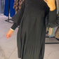 Vestido com mangas balão e gola alta