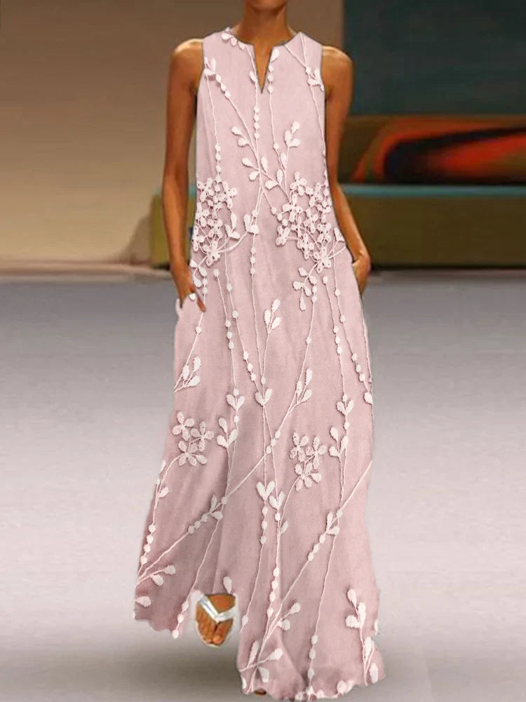 Vestido comprido elegante e fluído com renda bordada com flores