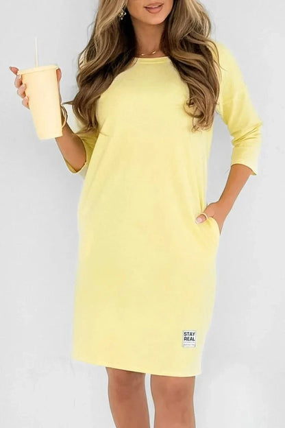 Vestido de mulher em algodão com decote redondo