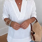 Blusa de algodão e linho com decote em V, minimalista e aconchegante