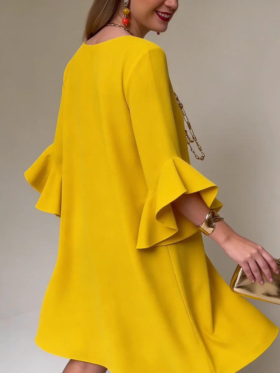 Vestido elegante e confortável com mangas franzidas