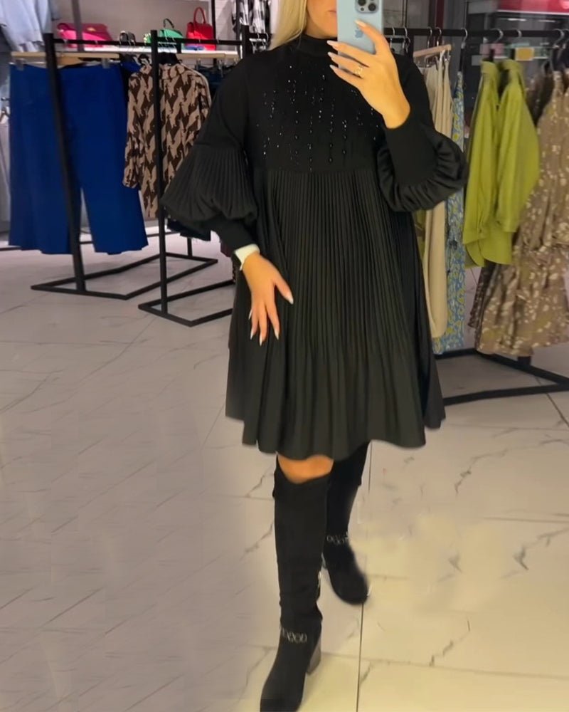 Vestido com mangas balão e gola alta