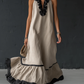 Vestido comprido elegante e romântico com folhos e blocos de cor