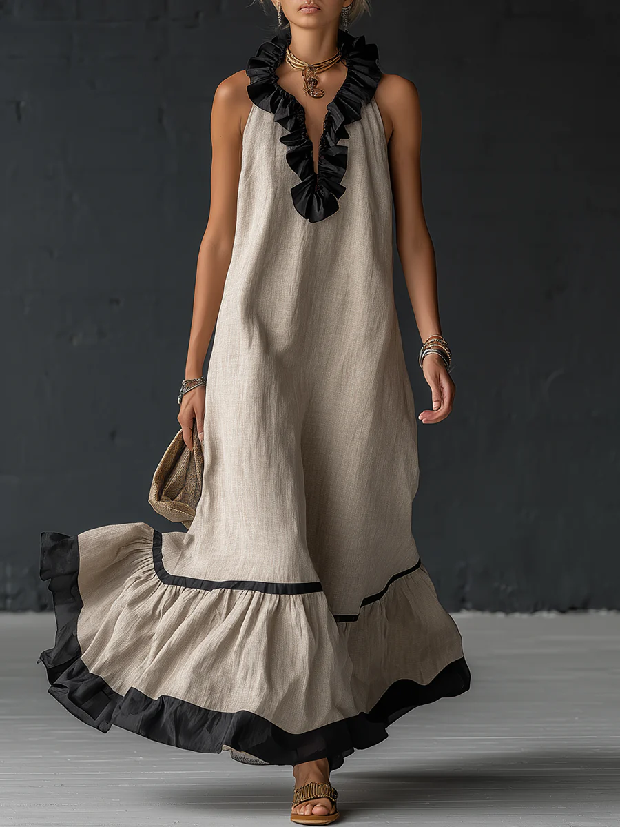 Vestido comprido elegante e romântico com folhos e blocos de cor