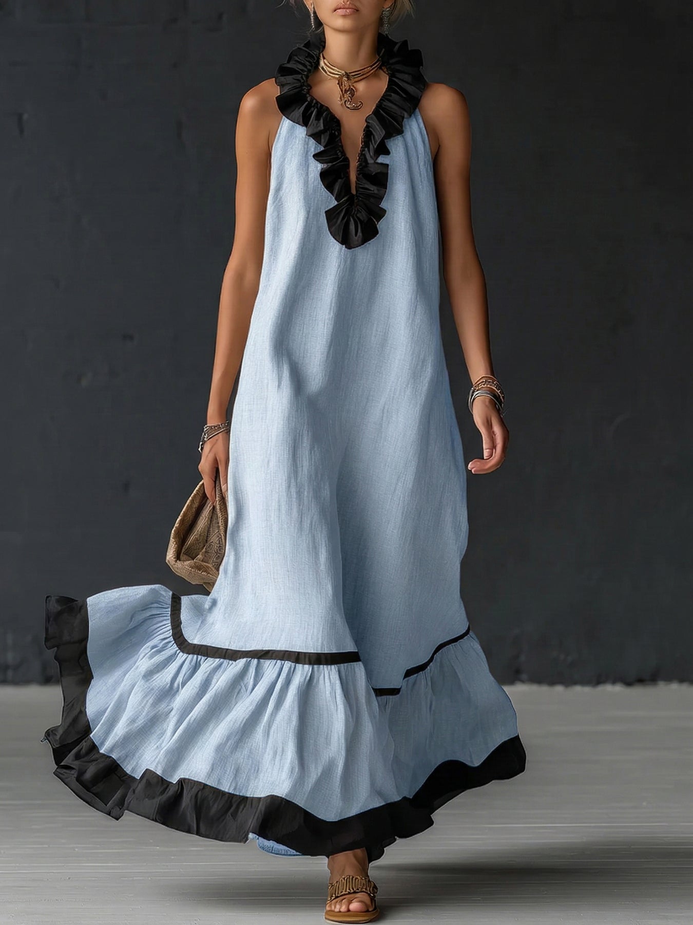 Vestido comprido elegante e romântico com folhos e blocos de cor