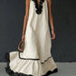 Vestido comprido elegante e romântico com folhos e blocos de cor