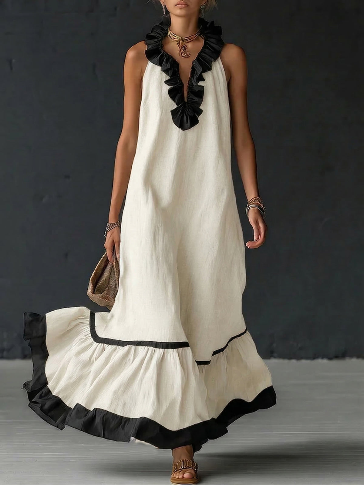 Vestido comprido elegante e romântico com folhos e blocos de cor