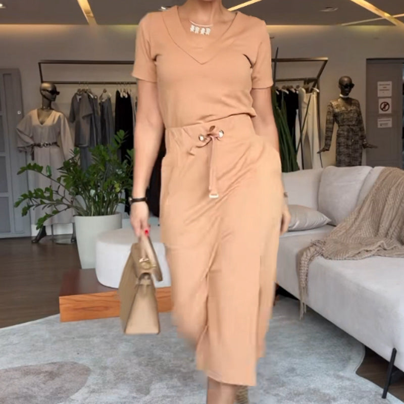Linda | Conjunto de menina com blusa decote em V e saia