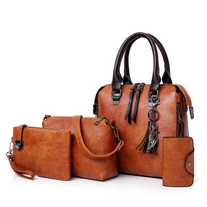 Disponível exclusivamente em conjunto de 🔥4 peças. Bolsa de senhora em couro.